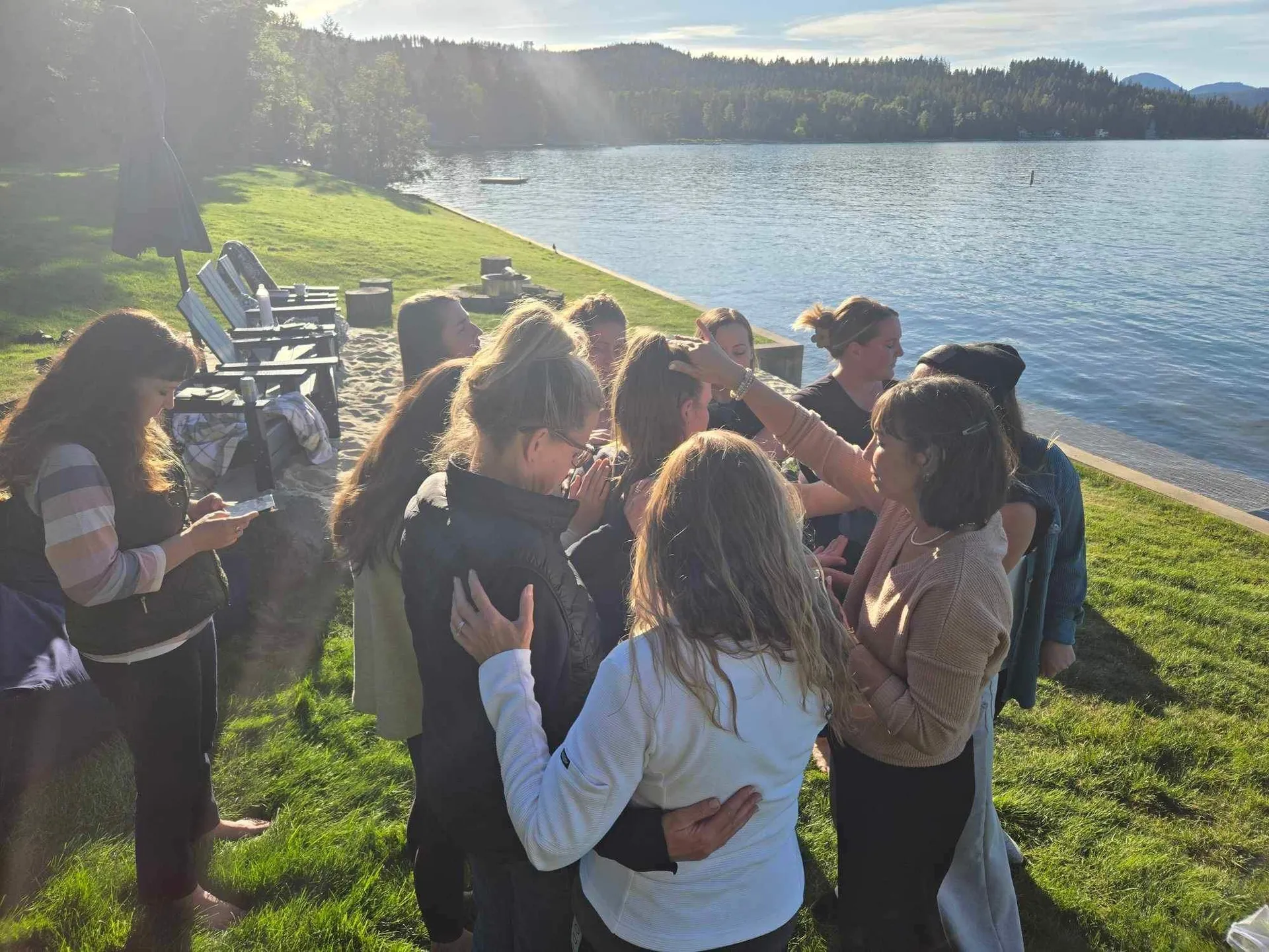 Women gathered in a prayer circle